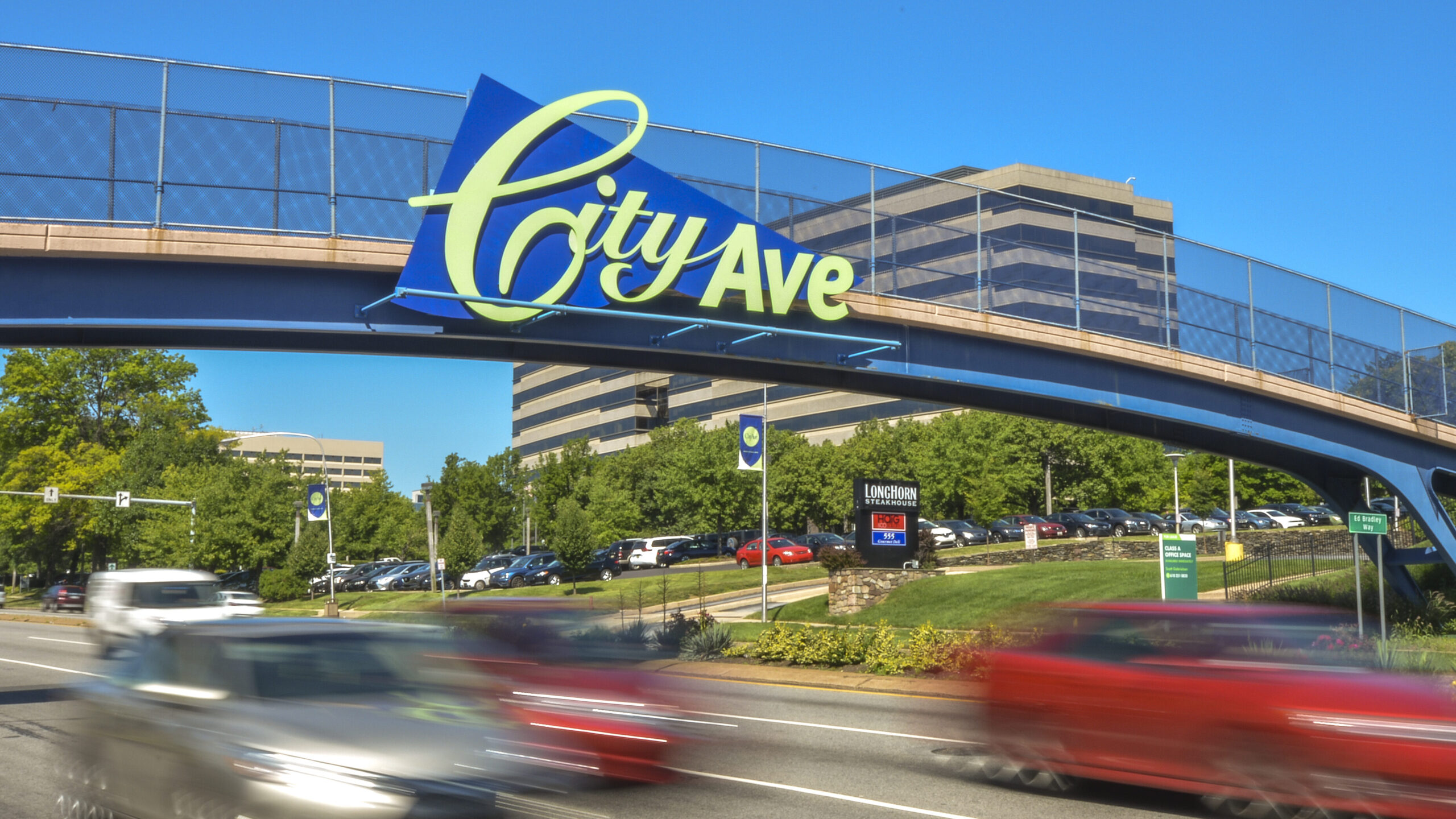 City Avenue bridge with large sign that reads "City Ave"